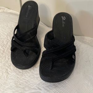 Black wedge heel flip flops